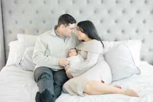 Pittsburgh in-home newborn photographer in bed