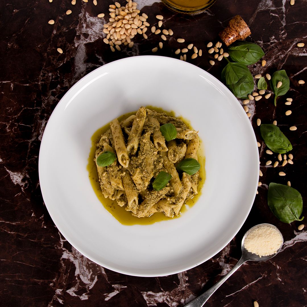 Food photography of Italian pasta and fresh ingredients dish in sydney, penne and pesto