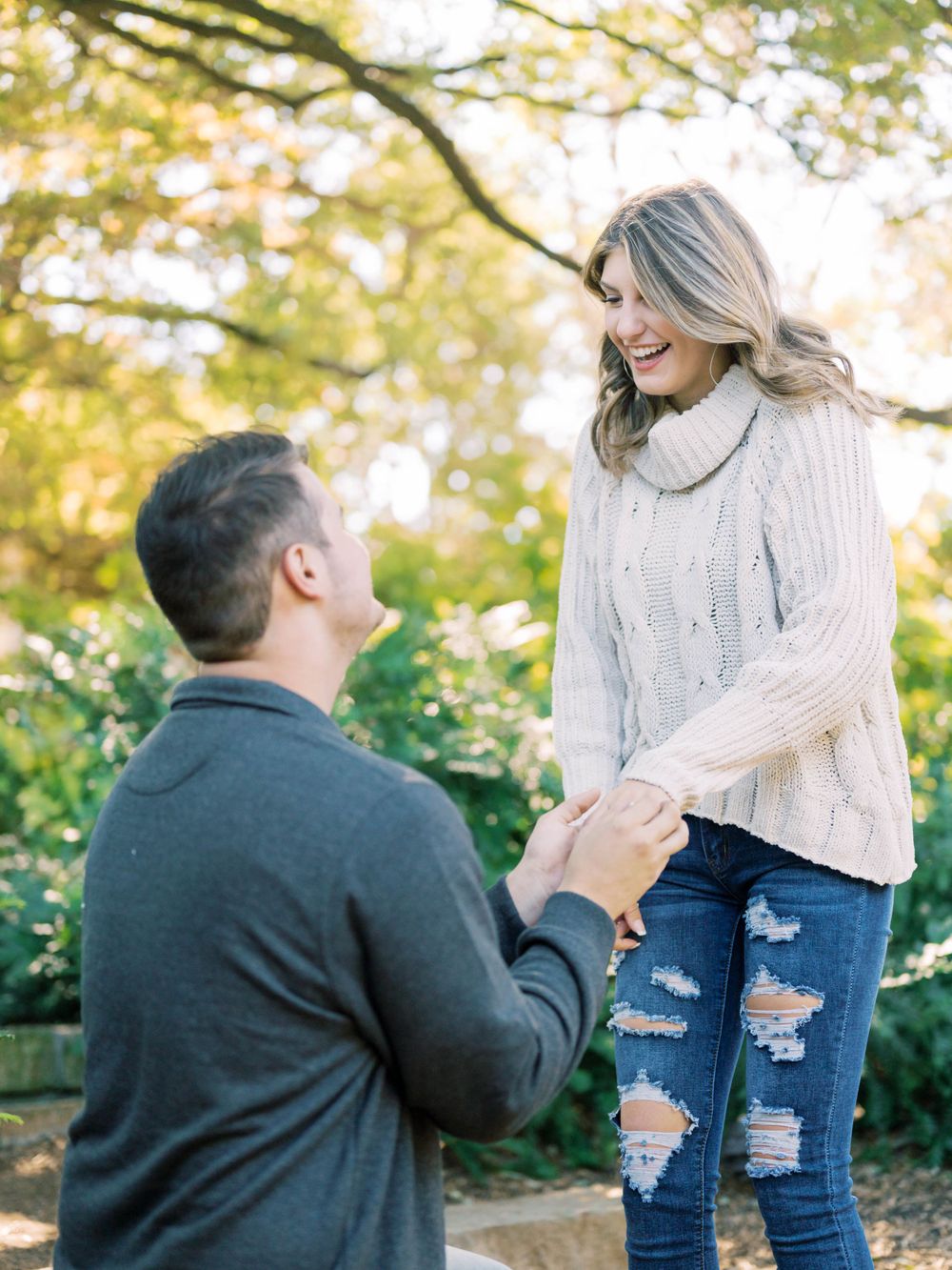 outdoor garden proposal of a man down on one knee