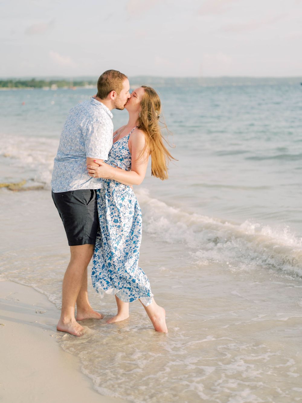 Couple kissing on the beach - Negril, Jamaica