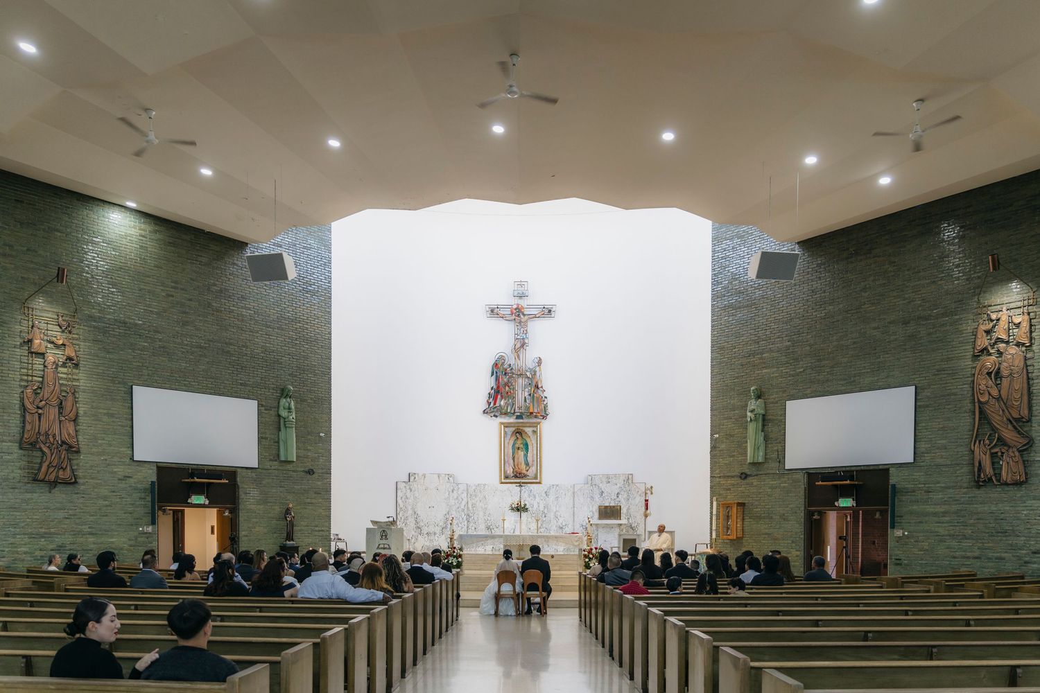 Modern church interior with stone walls and minimalist design features.