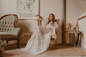 Elegant pose in flowing lace gown with botanical art and vintage furnishings in the Hudson Valley,NY.
