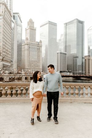 A romantic stroll along Chicago's downtown riverfront with historic architecture and modern buildings.