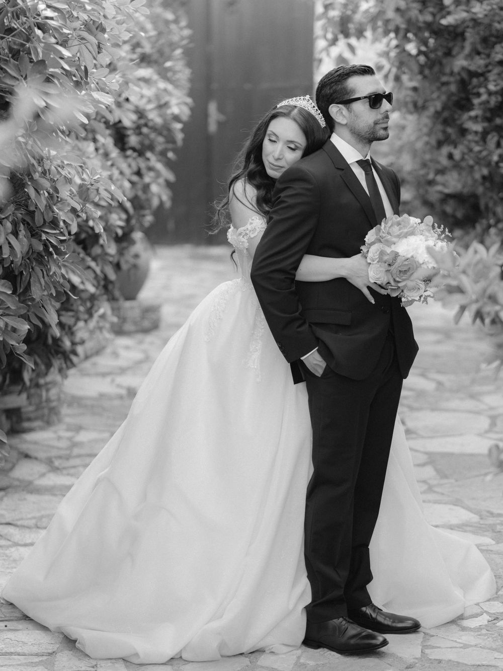 Destination wedding in Cyprus, Lefkara village. Black and white image of couple posing gorgeously