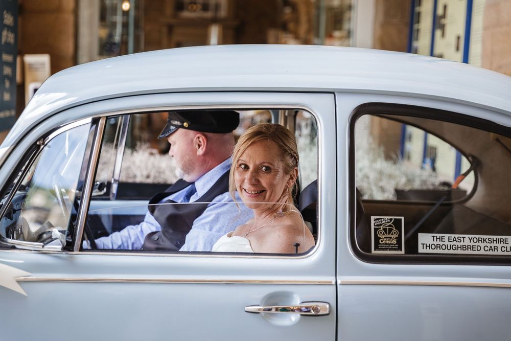Classic white vintage car shows through a series of stylized wedding transport photos.