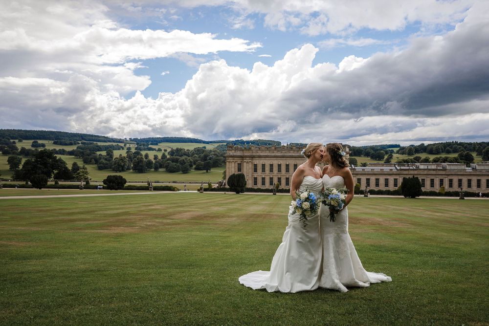 Wide landscape shots of an elegant country estate with dramatic cloud formations.