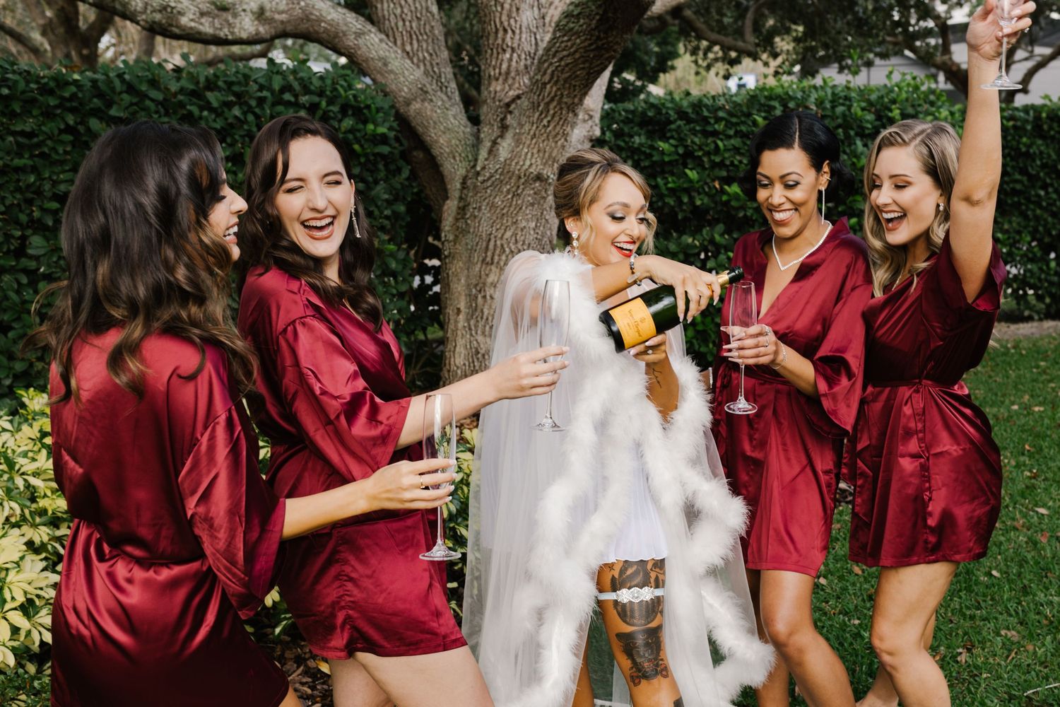 bride and bridesmaids partying authentic fun photo taken by photographer in orlando