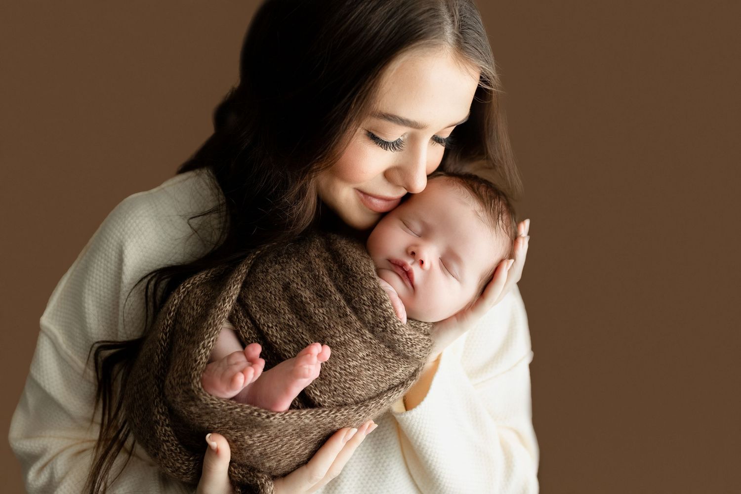 An up-close newborn shot with a mom holding their newborn. Greenville SC newborn photographer, Easley, SC newborn photographer, Upstate SC n