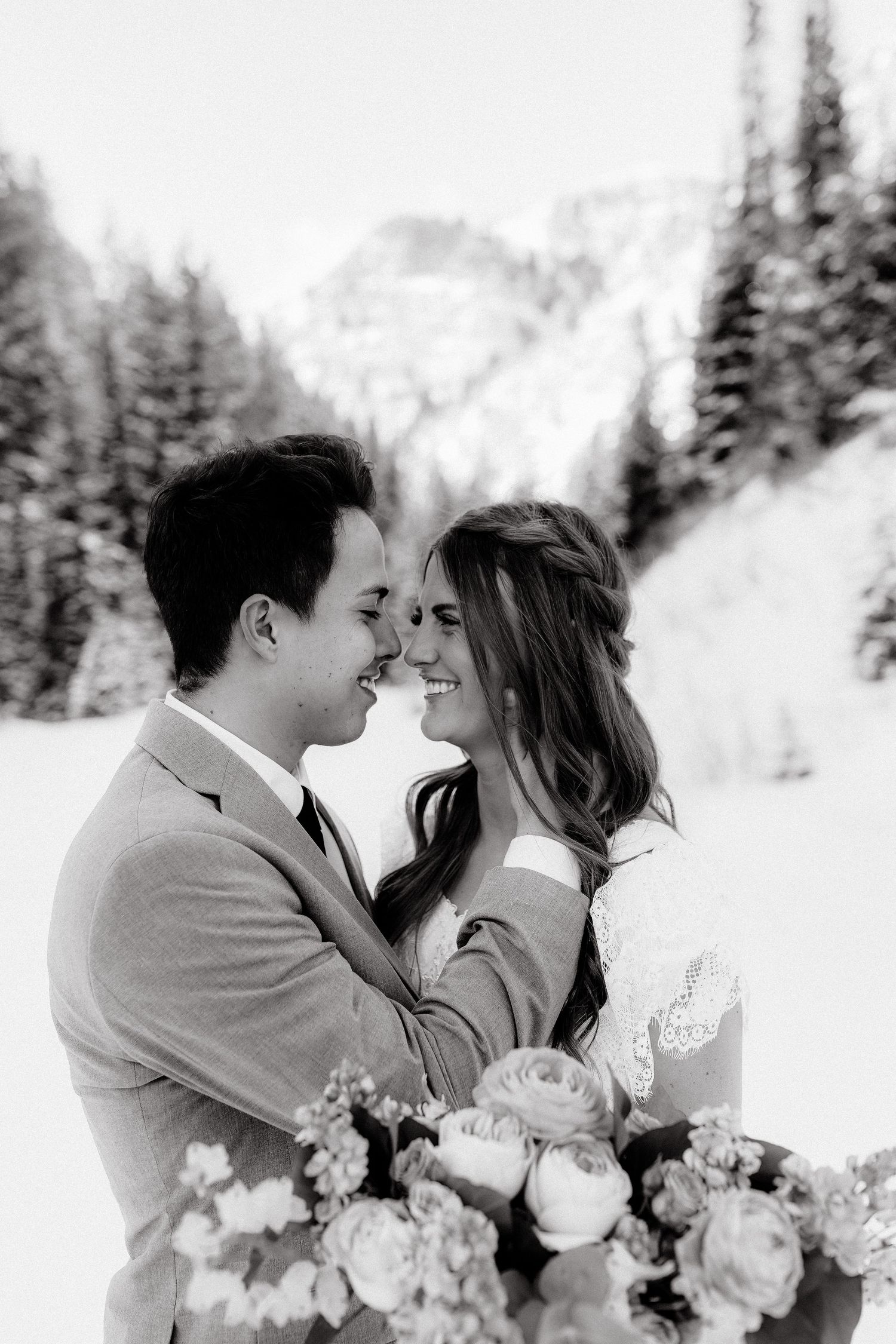 Bride and Groom flirting in black and white