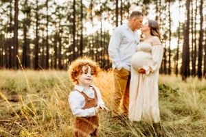 Adorable newborn captured with family in a beautiful New Haven, CT woodland photography session