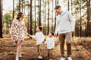 Family bonds with precious newborn in enchanting North Haven, CT woodland setting