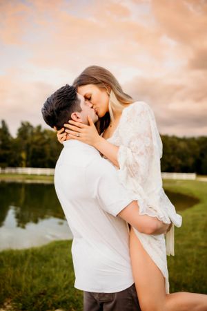 "Smiling couple posing in scenic Connecticut landscape near Yale University"