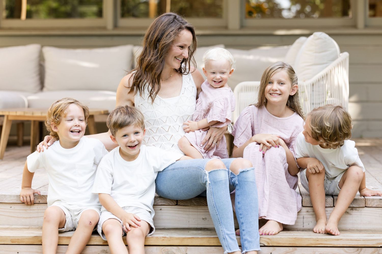 A mother with her 5 kids, photographed in their backyard by Blessie MJ Photo, best Waco photographer