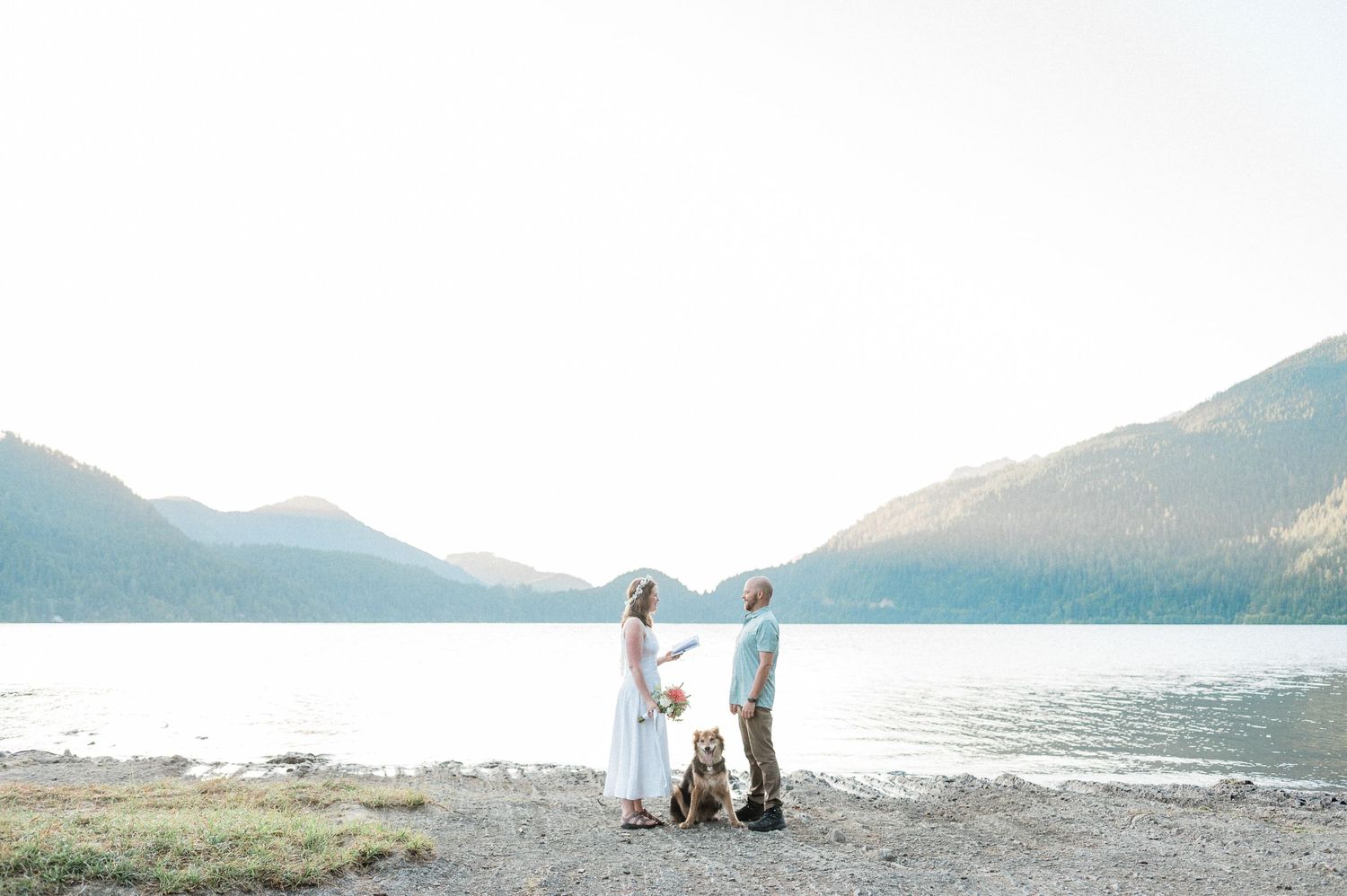Elopement at Lake Crescent with dog at sunrise. Photo by Pine + Vow, a Washington Elopement Photographer.