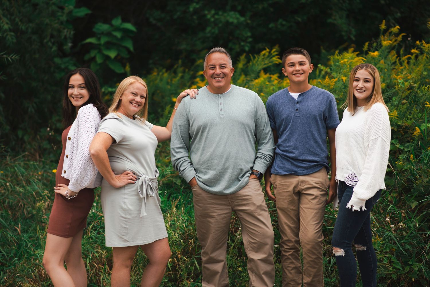 family pose fall forest portrait smiles photo
