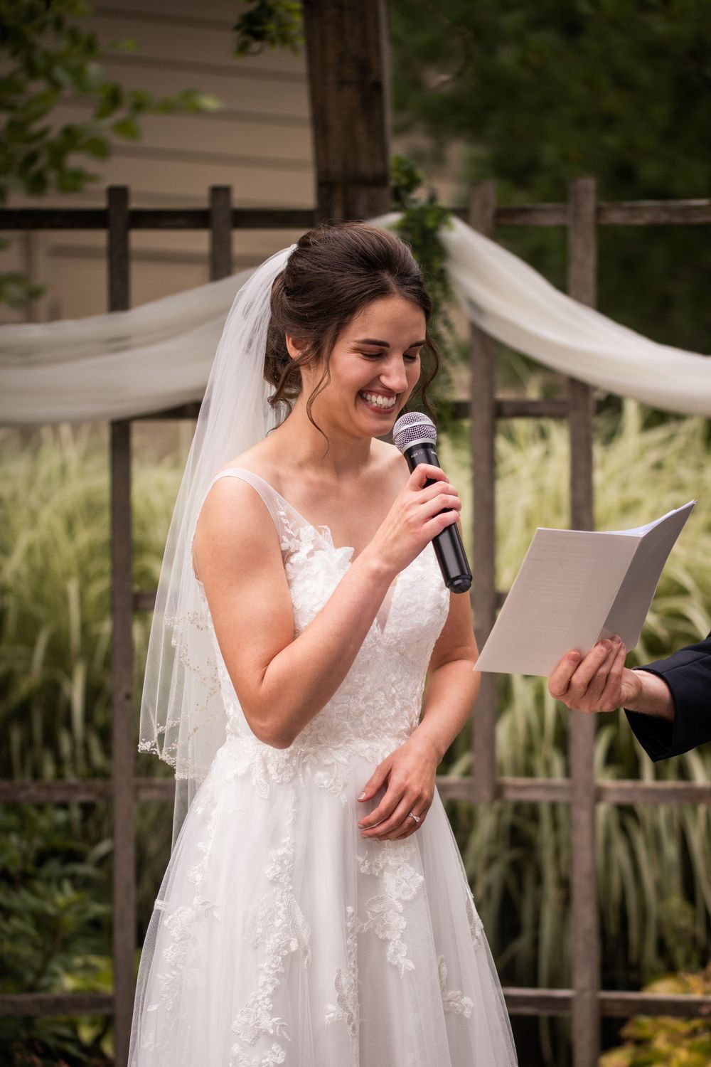 Exchange of vows outdoor wedding ceremony at Stratford Country Club
