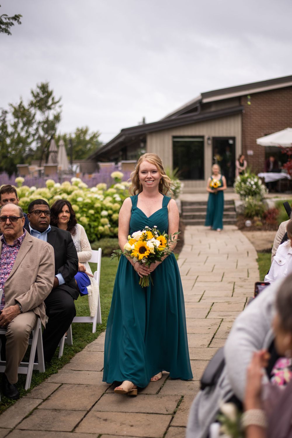 Bridesmaid processional outdoor wedding ceremony at Stratford Country Club