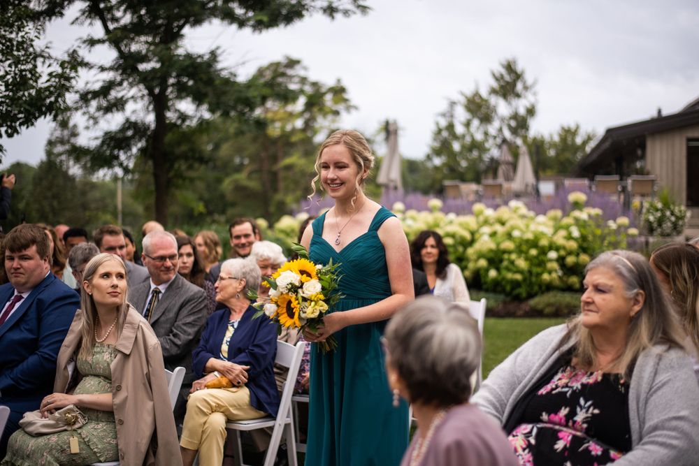 Bridesmaid processional outdoor wedding ceremony at Stratford Country Club