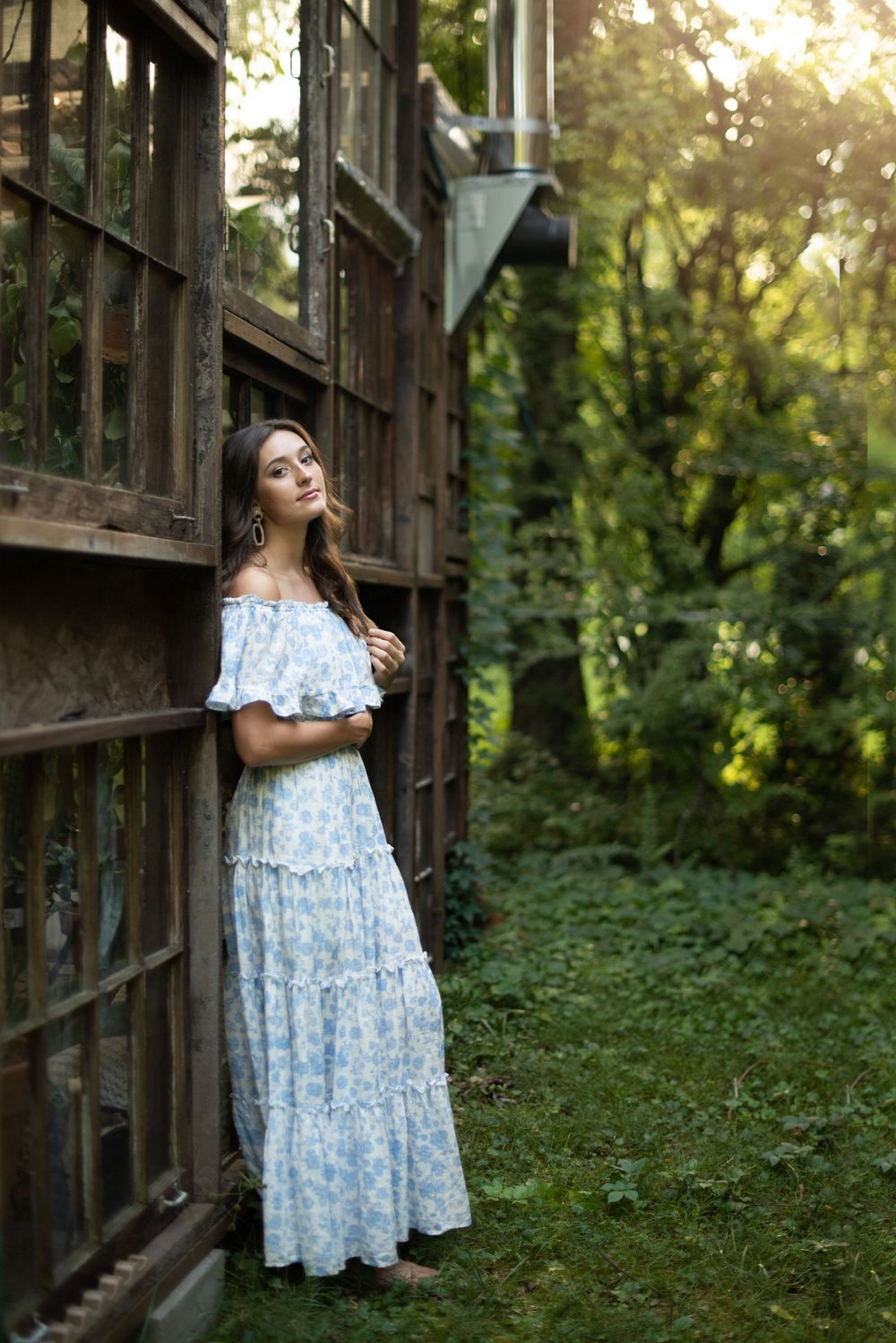 Spring Hill Senior Photographer at a glass house in Nashville