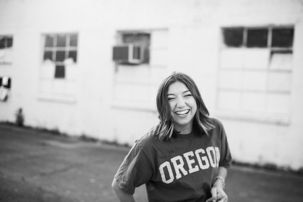 BGA Senior laughing with Oregon college shirt Columbia Tennessee senior photographer