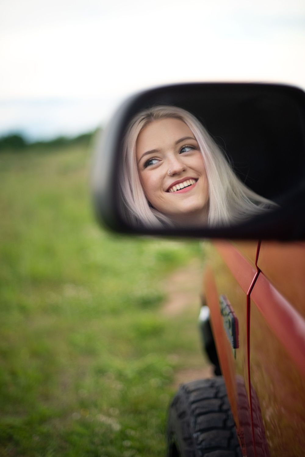 Nashville Photographer at Harlinsdale farm senior photos with red truck