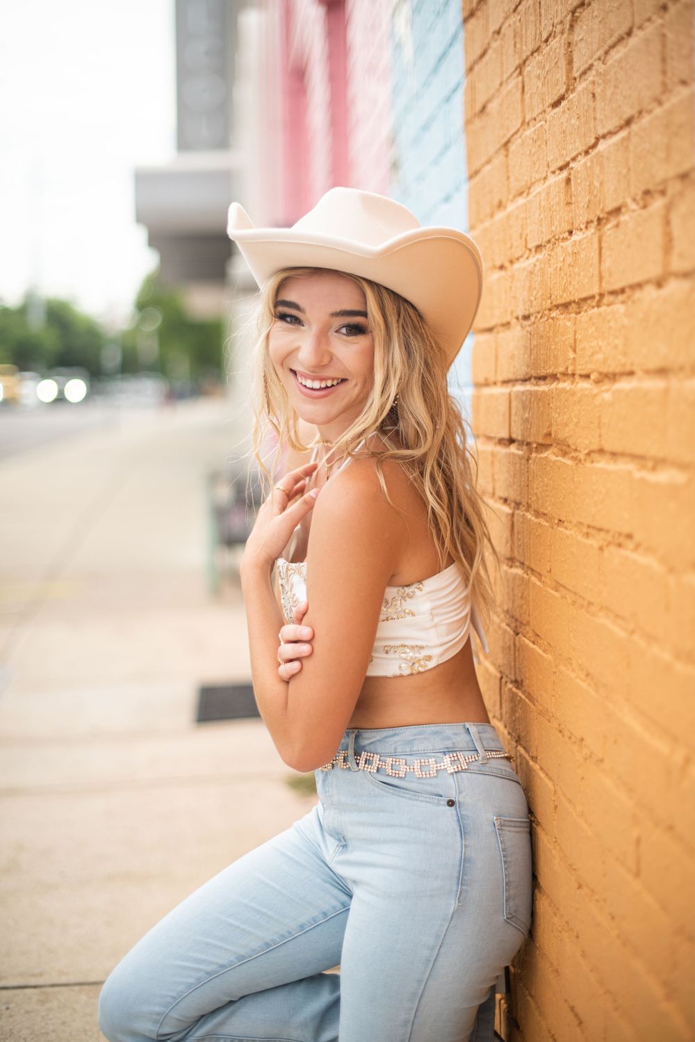 Nashville Senior Photographer in West End model with a cowboy hat