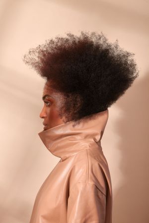 Black textured hair.