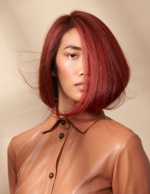 Red Bob hairstyle. Chinese girl.