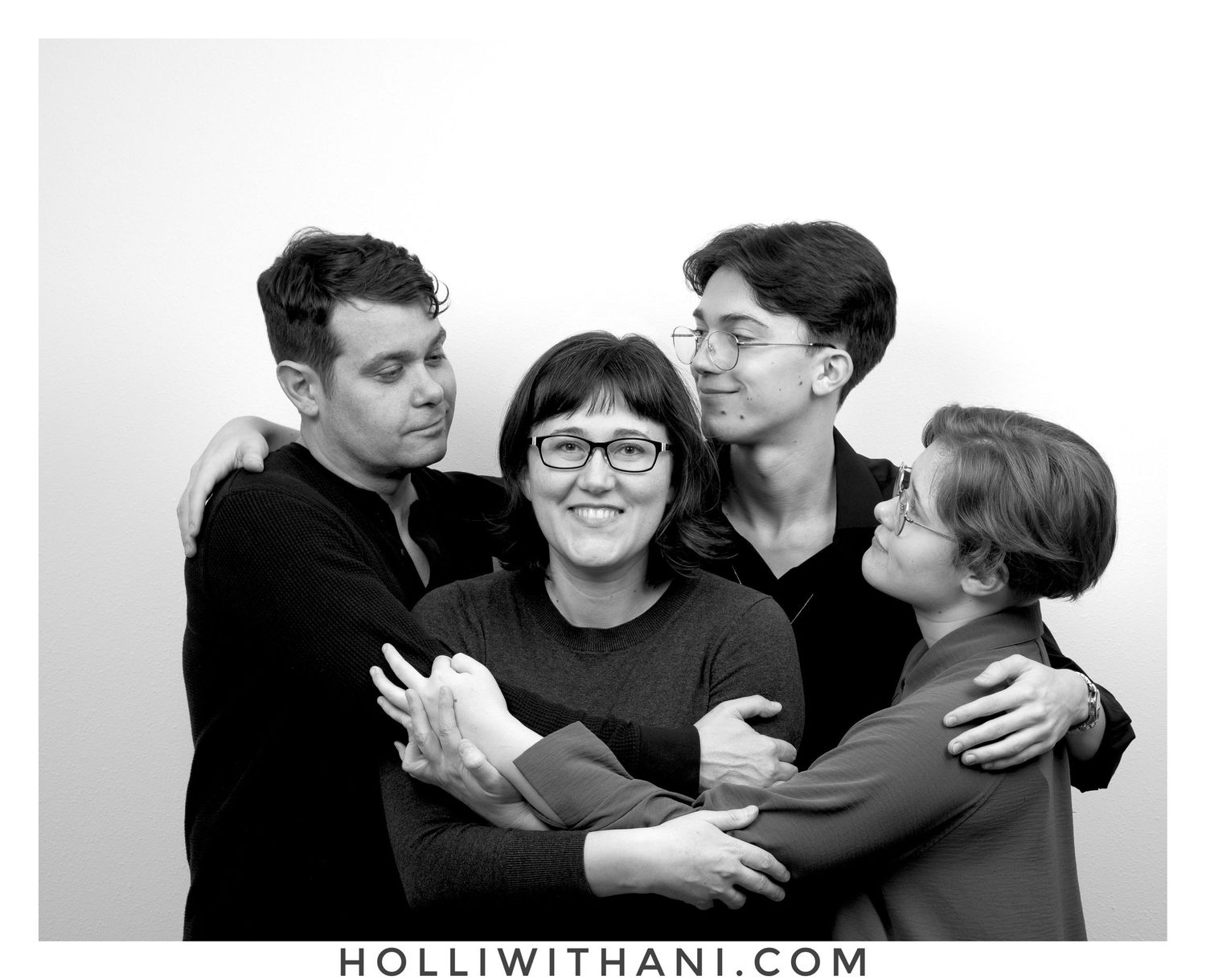 Black and White Photo of family hugging