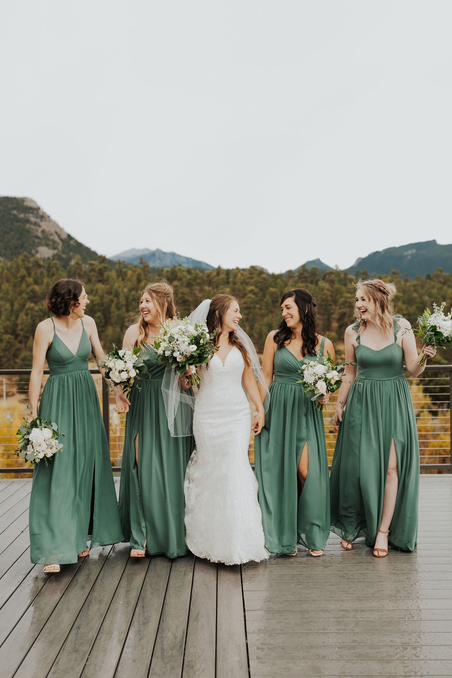 Bridesmaids walking on the terrace, Estes Park, CO