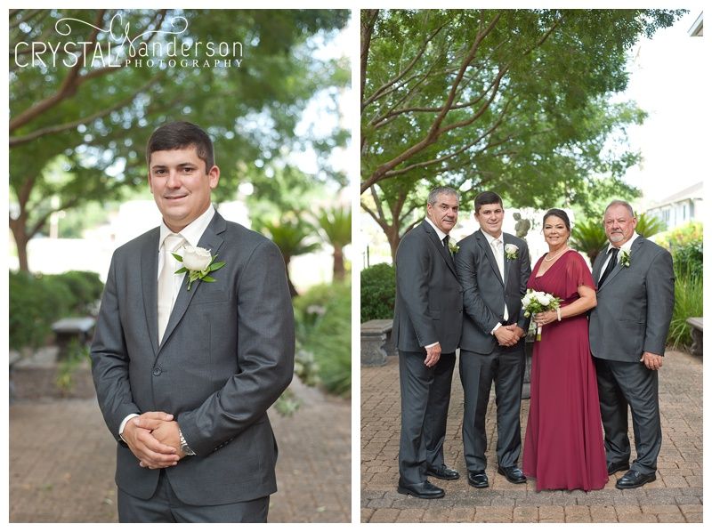 Wedding party members in burgundy and gray formal attire outdoors.