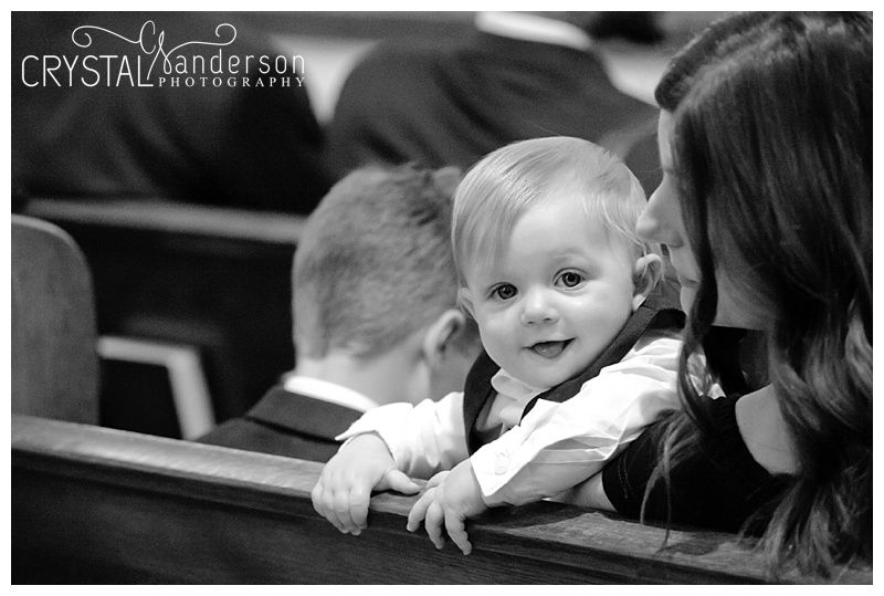 Black and white candid shots of a baby during wedding celebrations.