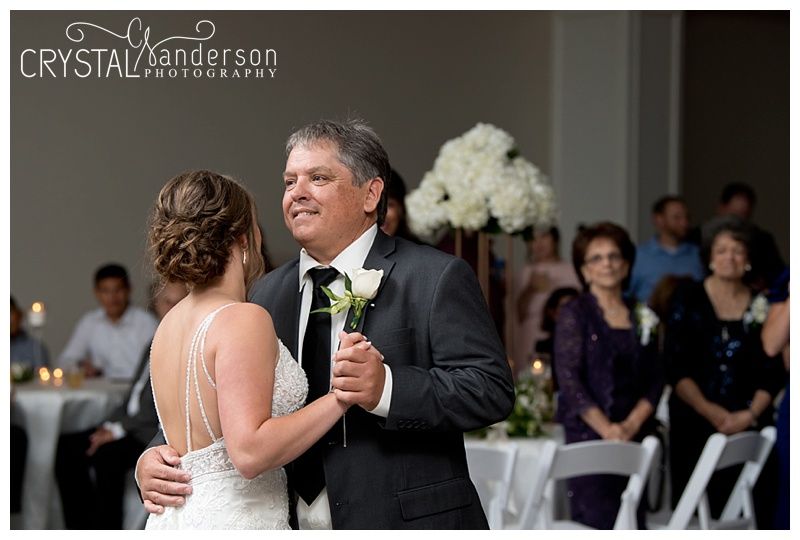 Candid reception moments captured in black and white during wedding celebration.