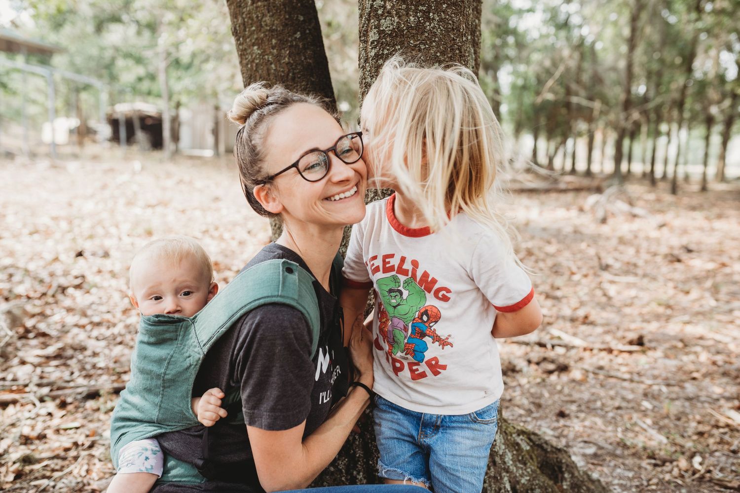 Lakeland newborn photographer- mom and kids in woods