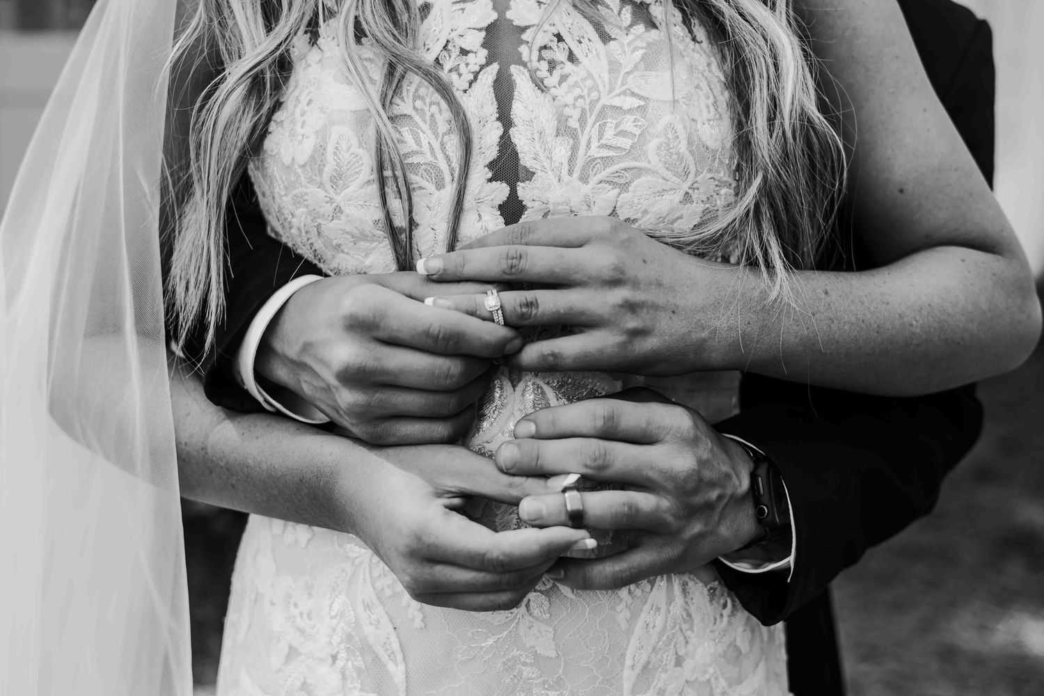 Sequential images showing hands and wedding rings against intricate white lace dress pattern.