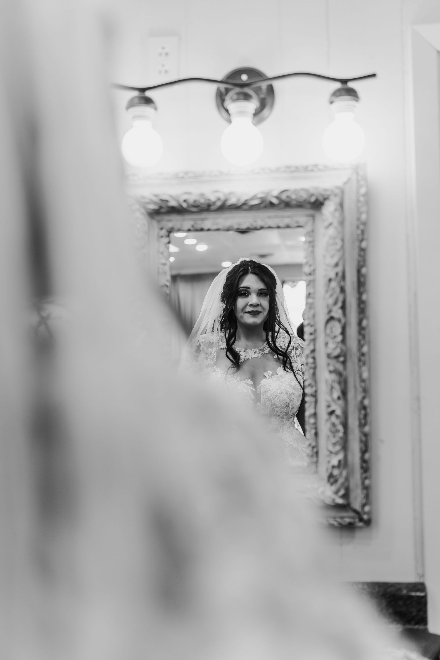 Artistic black and white reflection shots in ornate mirrors.