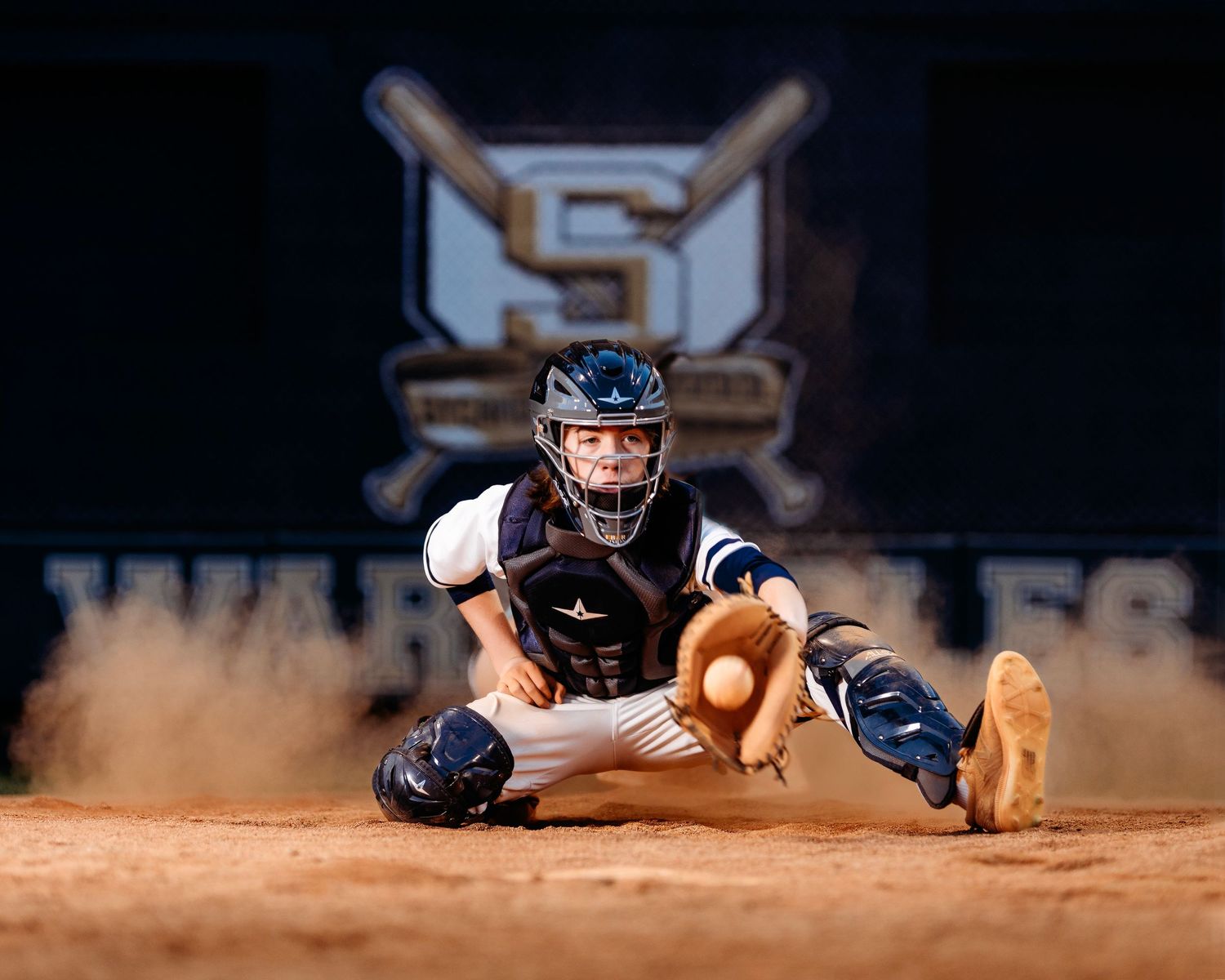 Action shots of baseball player Catching ball during senior session. Middle TN senior photographer