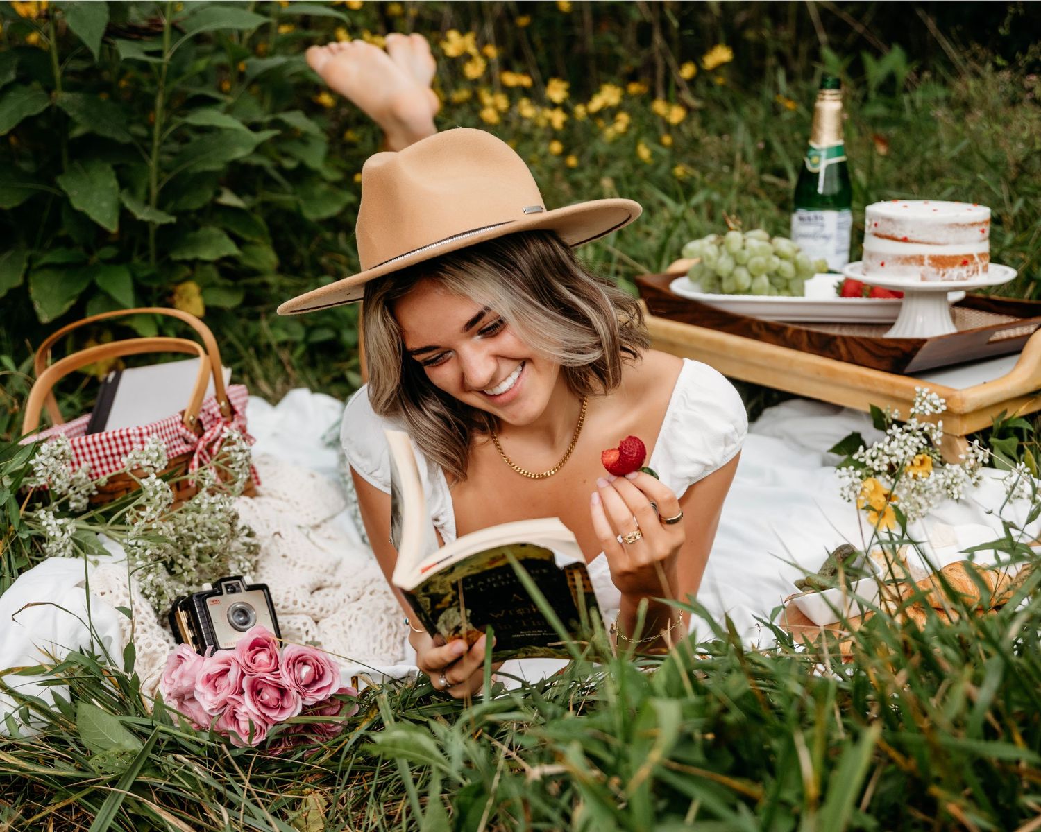 Artistic garden photoshoot with flowers and vintage props in natural sunlight. Middle TN senior photographer