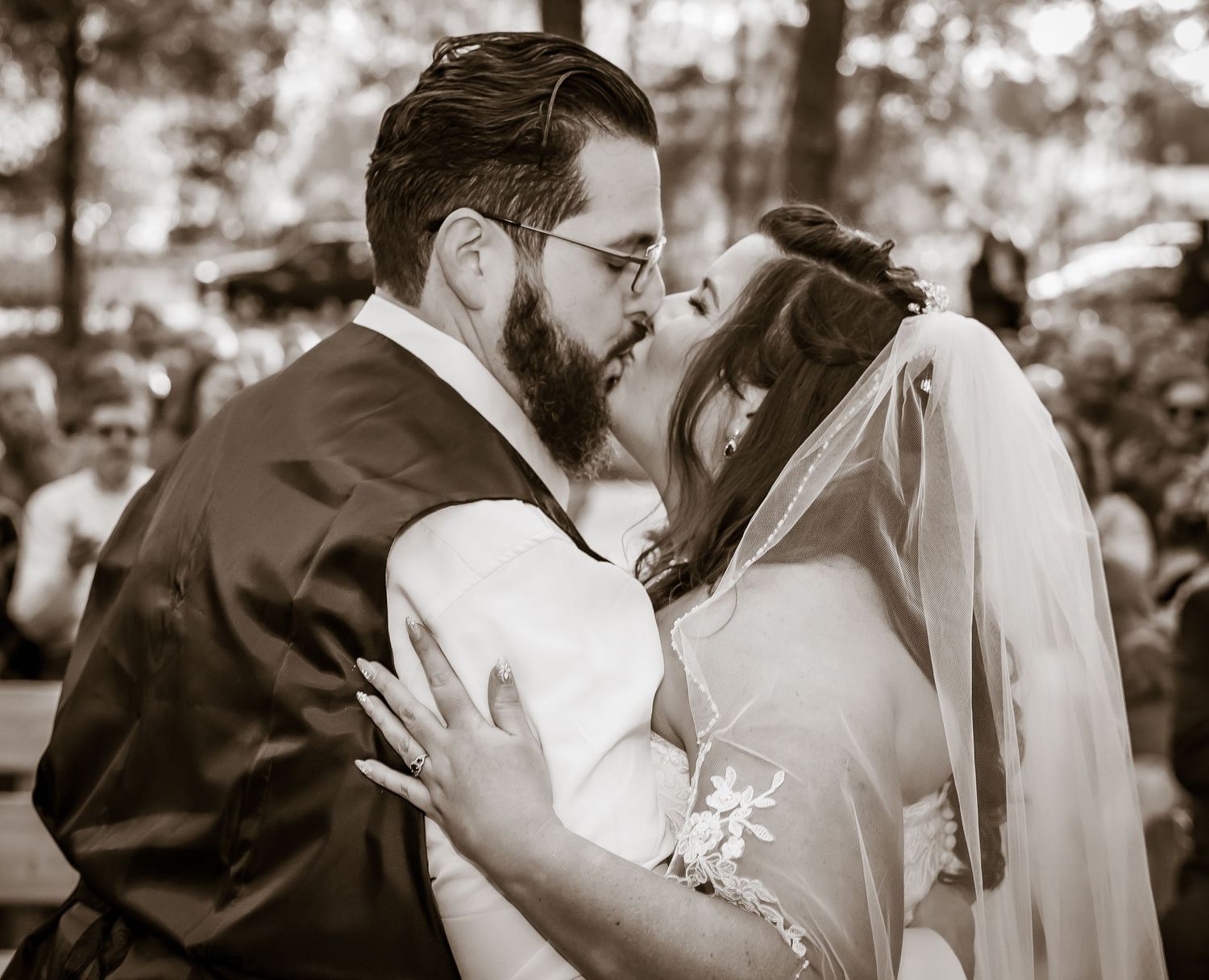 A romantic black and white wedding sequence showing tender moments between newlyweds.