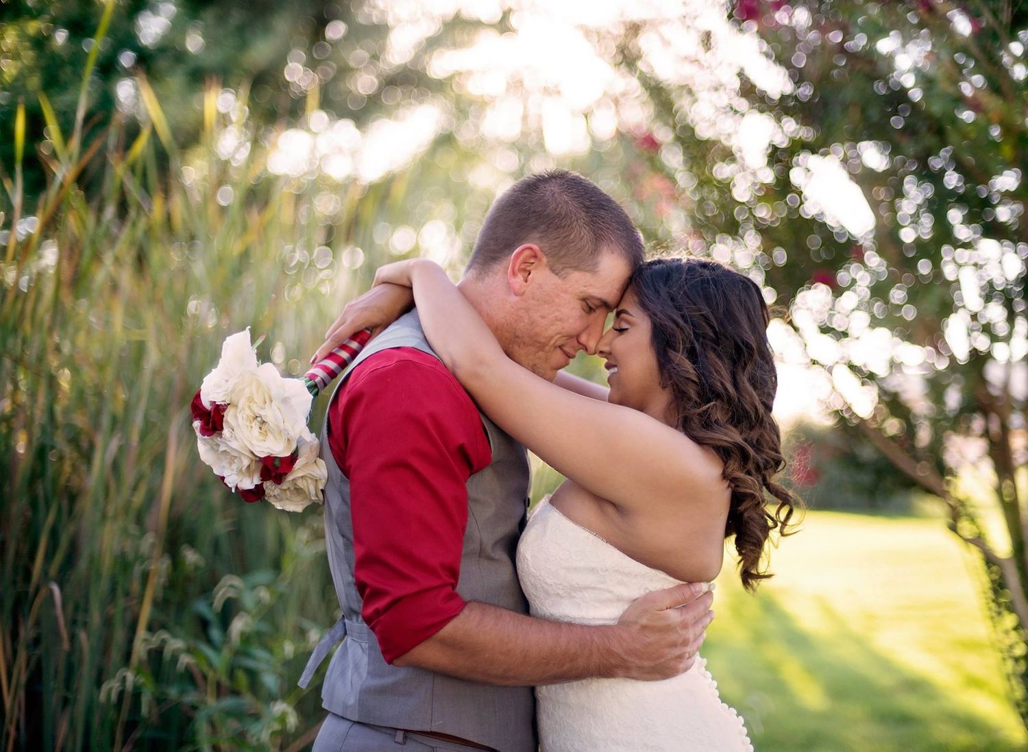 Romantic wedding portraits captured in golden hour lighting among tall grass at the shack in the back in midland texas.