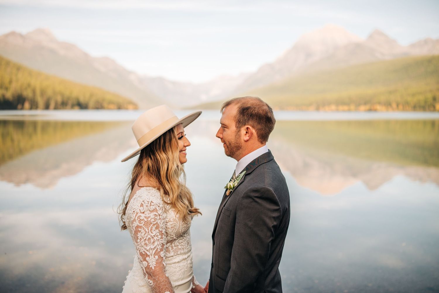 couple getting married at bowman Lake in glacier national park