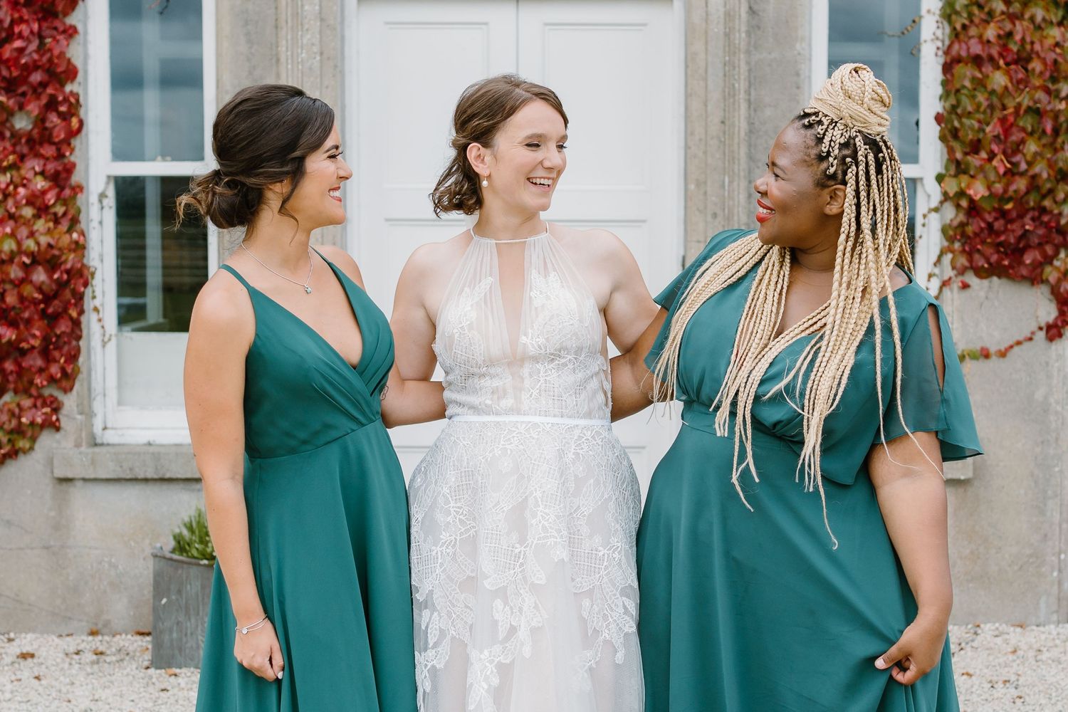 bride and bridesmaids laughing