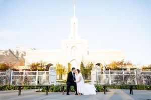 Wedding ceremony photos taken outside a majestic white church or temple.
