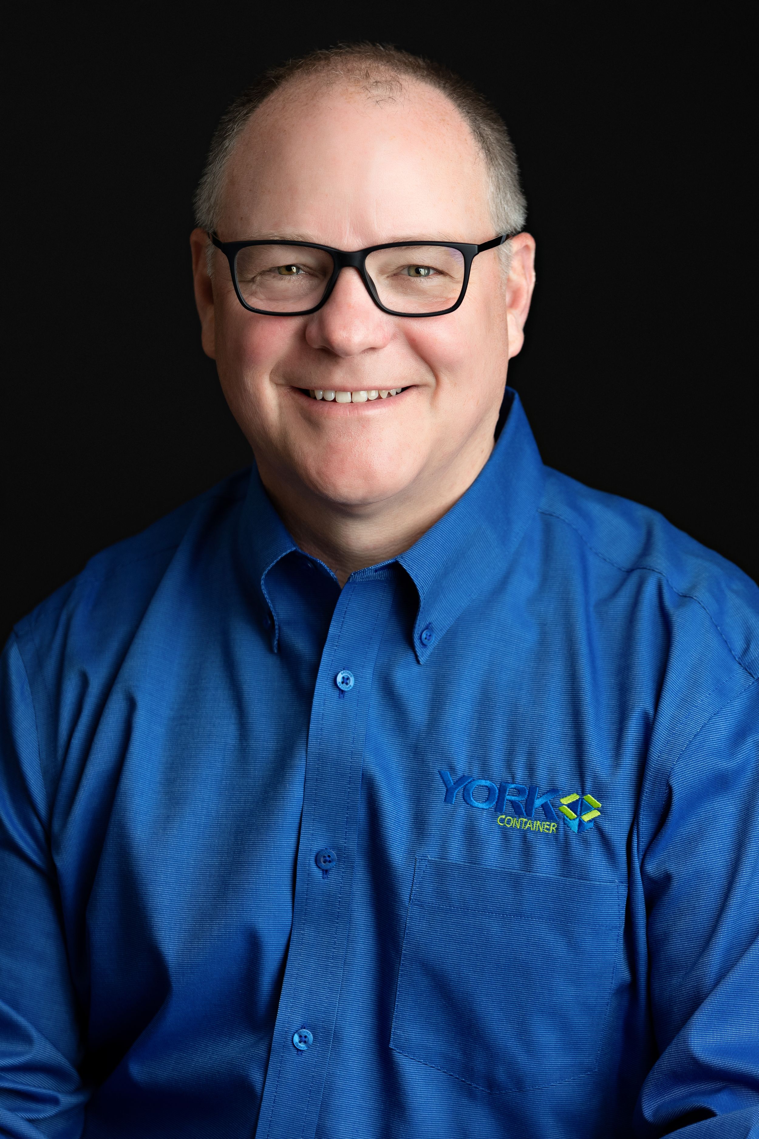 A Corp headshot of a man wearing blue. Greenville SC Boudoir, Easley SC Boudoir, Upstate SC boudoir