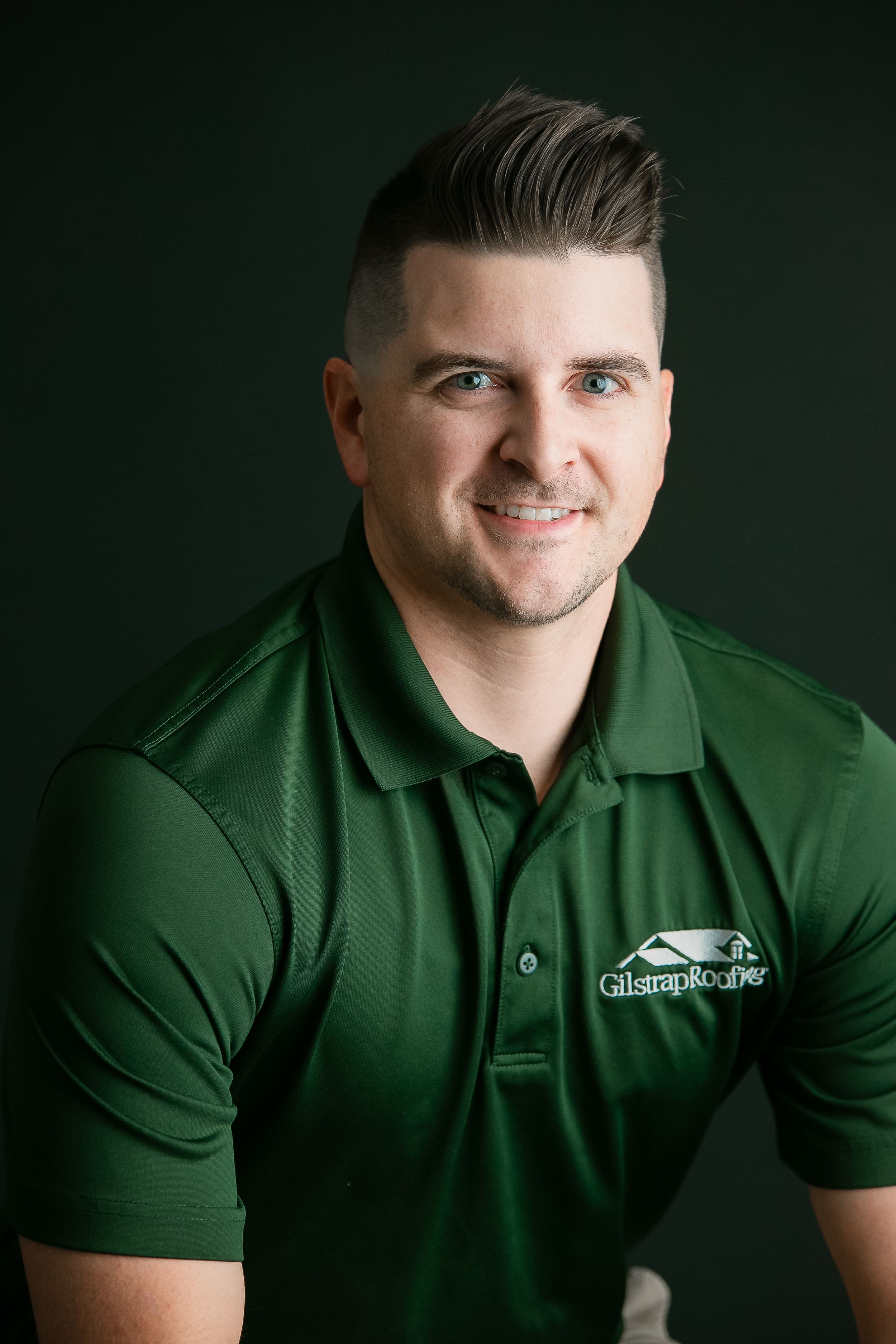 A male sitting for his headshot wearing a green shirt. Greenville SC Boudoir, Easley SC Boudoir, Upstate SC boudoir