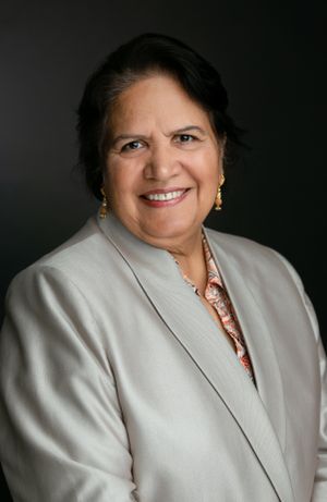 An Indian woman with a blazer in her headshot. Greenville SC Boudoir, Easley SC Boudoir, Upstate SC boudoir
