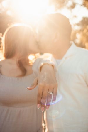 Engagement ring, hands, details, sunset