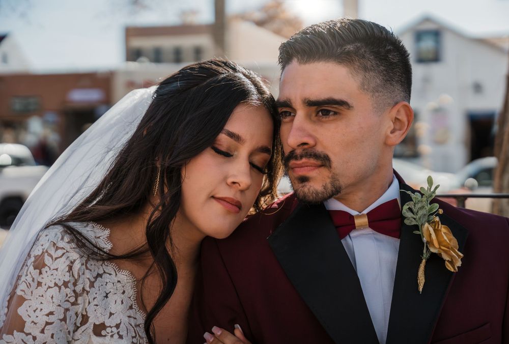 Intimate romantic couples share tender moments in an outdoor setting at sunset.