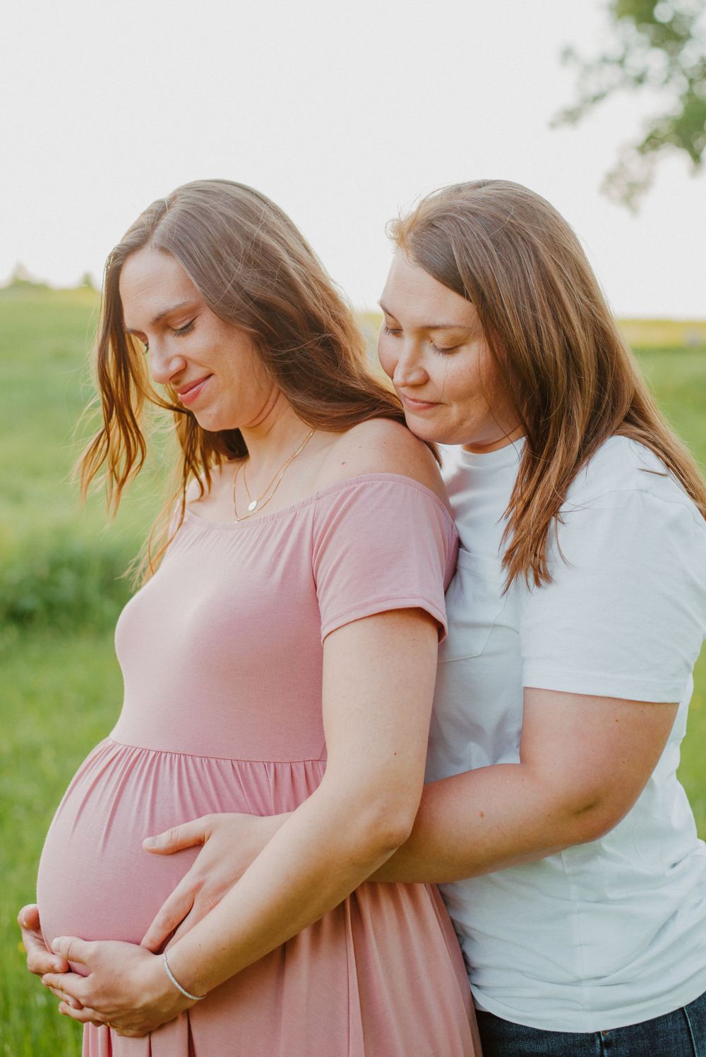 Two moms maternity session in Valley Forge Park during Golden Hour