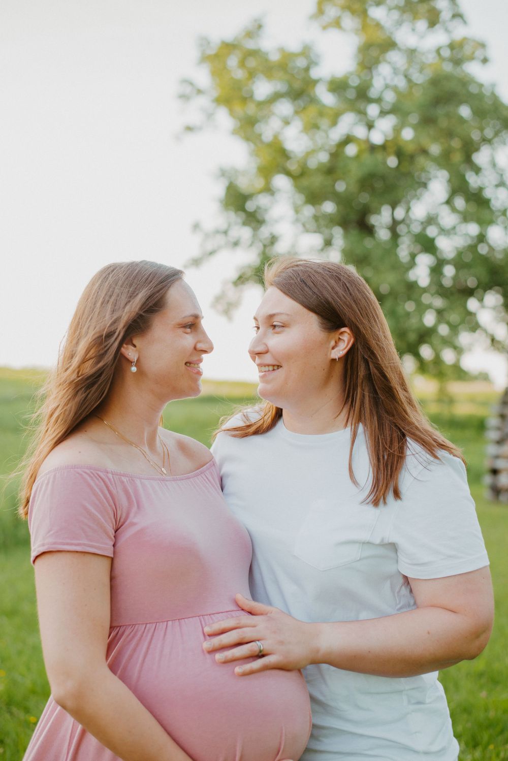 Two moms during maternity session in Valley Forge Park
